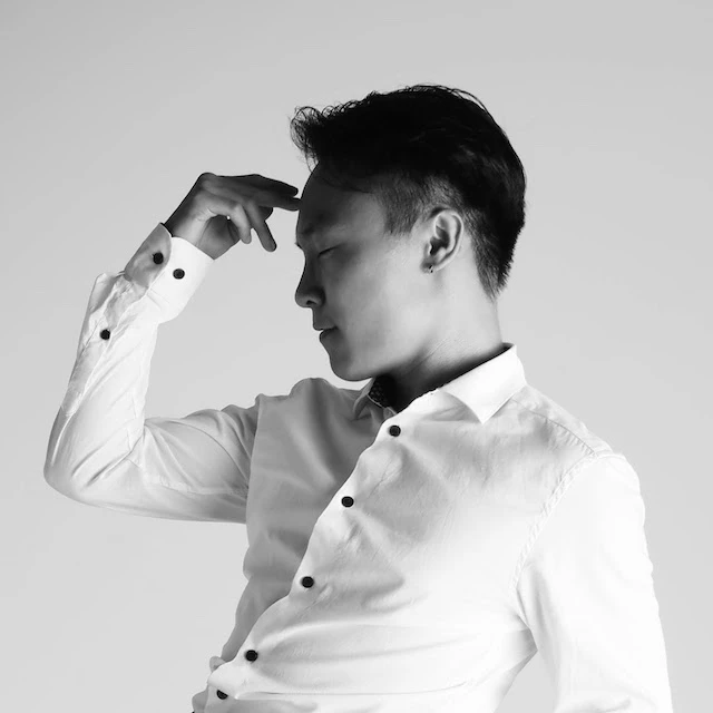 assets/images/my-photos/huy-thinking-bw.webp